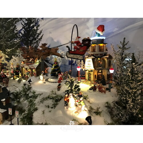 Композиция Санта-Клаус мчится на праздник, 32*33*33 см, музыка, движение Lemax