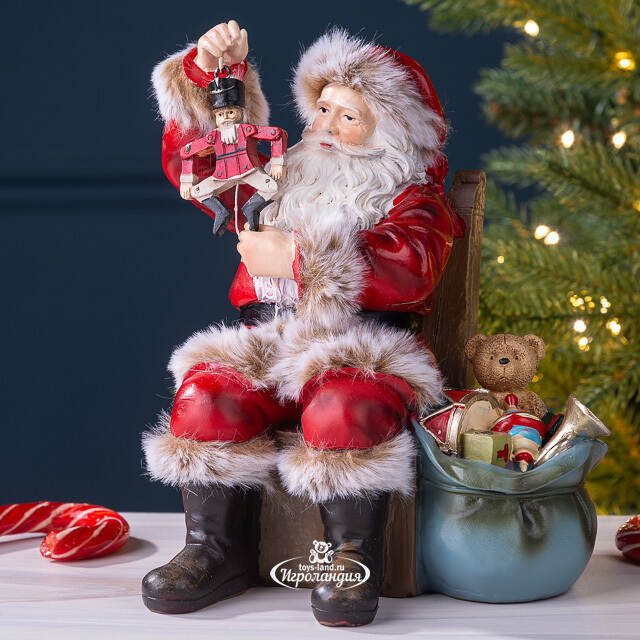 Фигурка Санта Клаус со щелкунчиком в красном кафтане - Merry Christmas 19 см Winter Deco