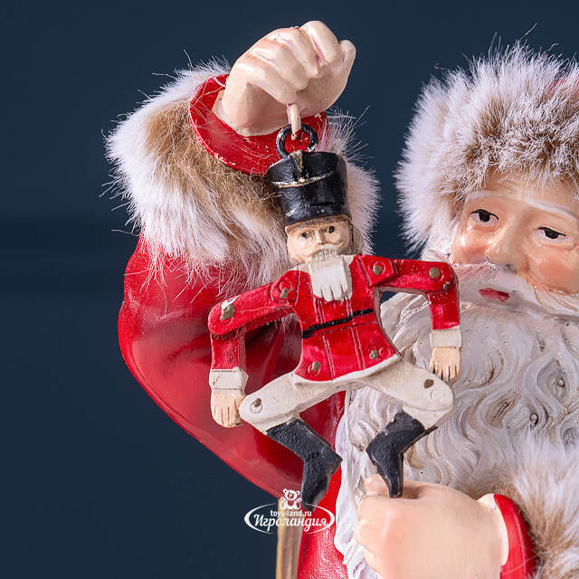 Фигурка Санта Клаус со щелкунчиком в красном кафтане - Merry Christmas 19 см Winter Deco
