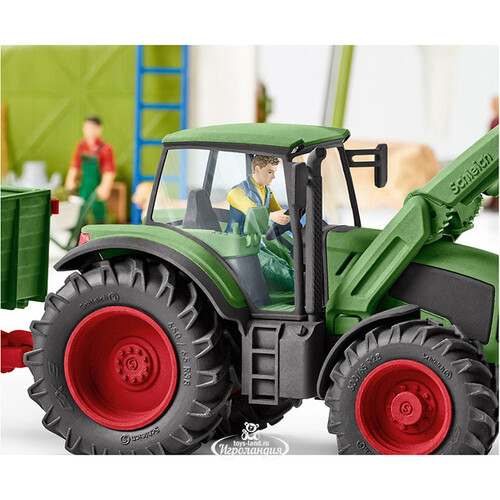 Игровой набор Фермерский трактор с прицепом, с фигурками и аксессуарами Schleich