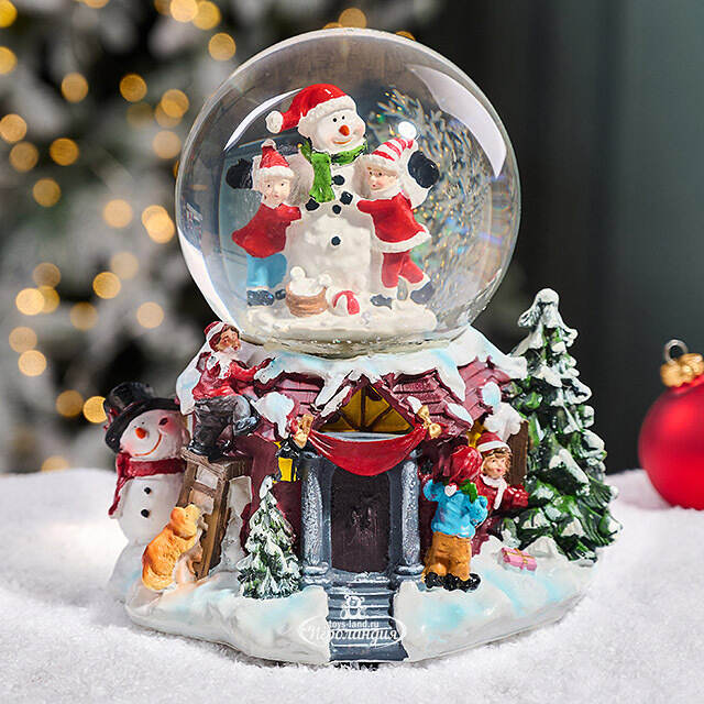 Снежный шар Christmas Fun: Снеговик и дети 21 см, с подсветкой, музыкой и движением, на батарейках Kaemingk (Кейминг)