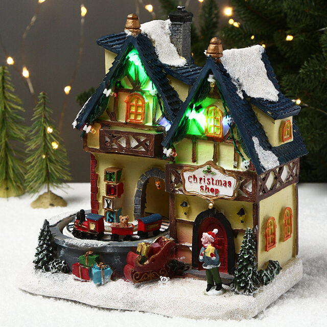 Светящийся новогодний домик Christmas Village: Магазин игрушек в Оберштайне 21*20 см, на батарейках Kaemingk