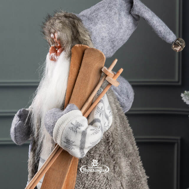 Санта - Северный волшебник с подарками и лыжами 45 см Peha