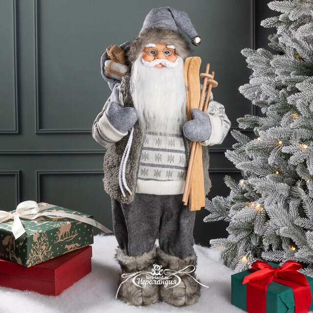 Санта - Северный волшебник с подарками и лыжами 60 см Peha
