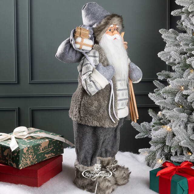 Санта - Северный волшебник с подарками и лыжами 60 см Peha