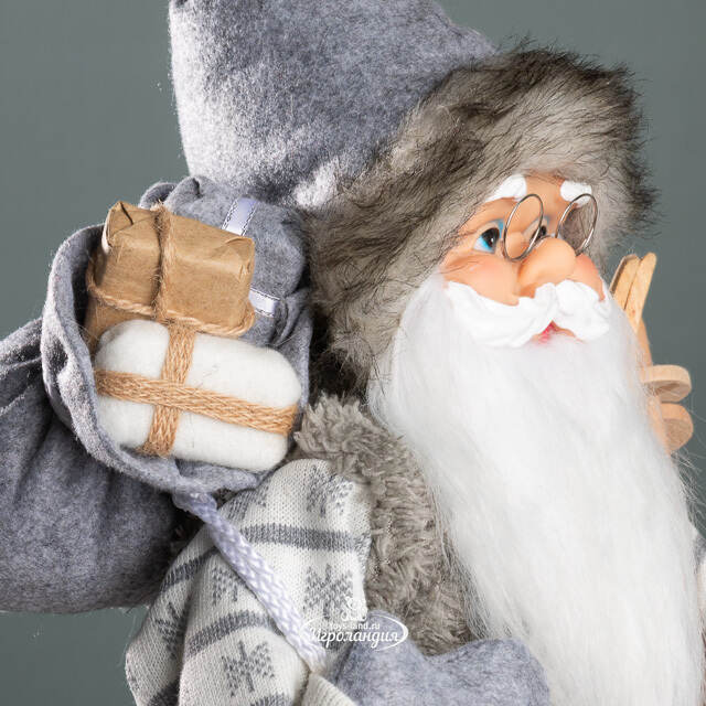 Санта - Северный волшебник с подарками и лыжами 60 см Peha