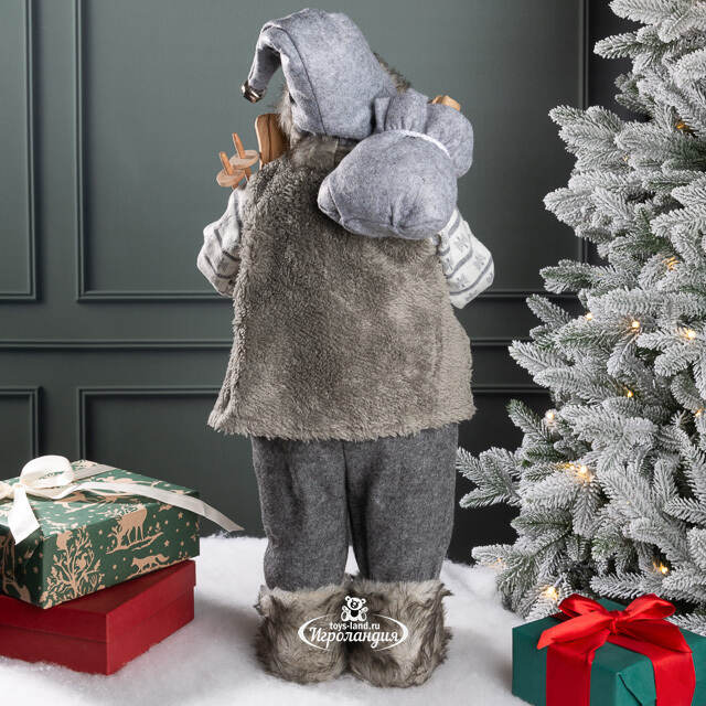 Санта - Северный волшебник с подарками и лыжами 60 см Peha