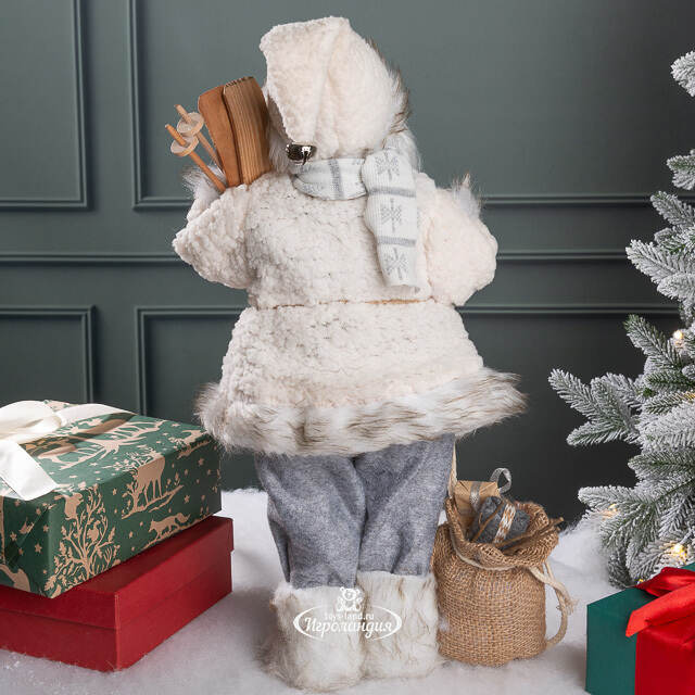 Санта в овечьей шубе с подарками и лыжами 46 см Peha