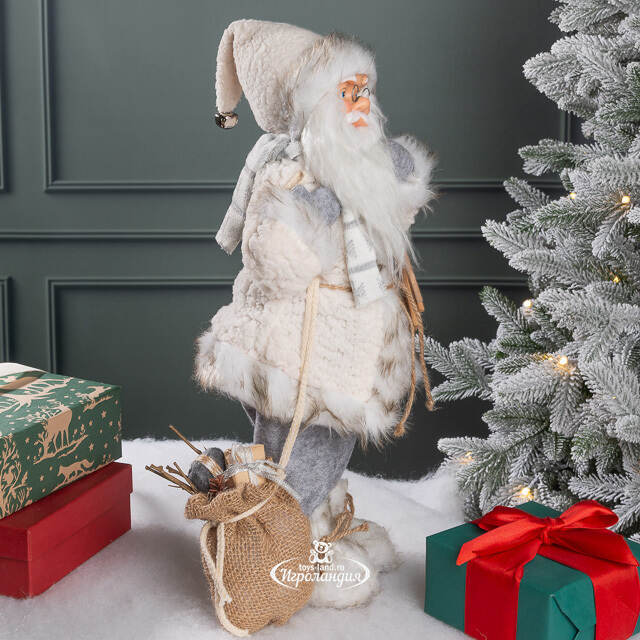 Санта в овечьей шубе с подарками и лыжами 46 см Peha