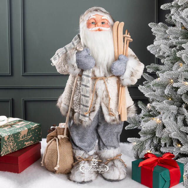 Санта в овечьей шубе с подарками и лыжами 61 см Peha