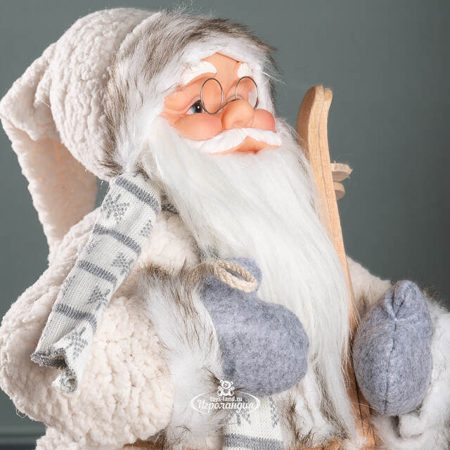Санта в овечьей шубе с подарками и лыжами 61 см Peha