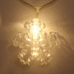 Светодиодная гирлянда Прищепки Снежинки 4 м, 20 теплых белых ламп, прозрачный ПВХ, IP20 Serpantin фото 2