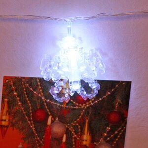 Светодиодная гирлянда Прищепки Снежинки 4 м, 20 холодных белых ламп, прозрачный ПВХ, IP20 Serpantin фото 3