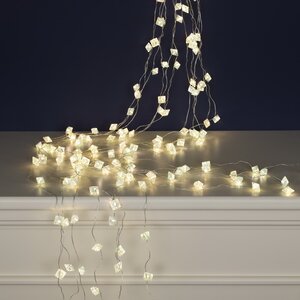 Гирлянда на елку 100-150 см Лучи Росы - Льдинки, 12 нитей, 180 теплых белых LED ламп, серебряная проволока, IP20 Kaemingk фото 1
