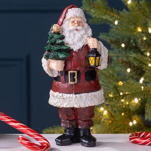Новогодняя фигурка Санта Клаус с фонариком и елочкой 20 см