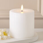 Светодиодная свеча с имитацией пламени Манарола 10*10 см, белая, таймер, на батарейках