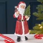 Декоративная фигурка Санта Клаус с зеленой елочкой 20 см красный